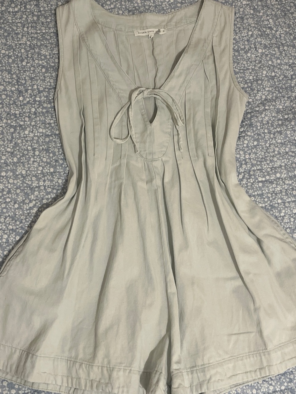 Altar'd State- soft light blue denim Sleeveless Tie-Front shorts romper